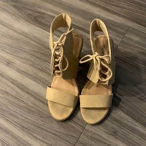 Women’s 8.5 tan Soda heels.